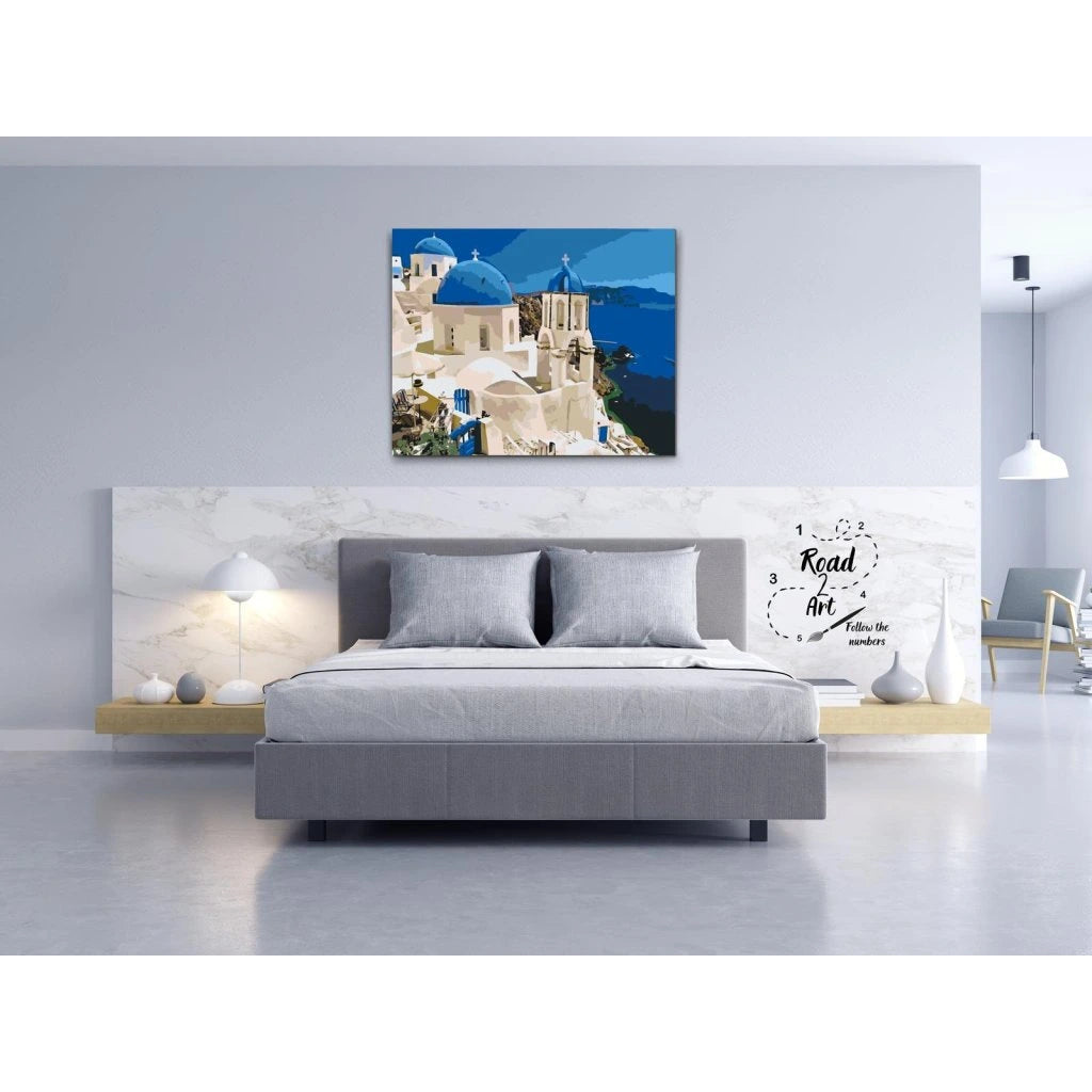 måla en ikonisk santoriniutsikt med vitt och blått motiv